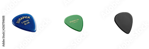 Fotografie set plastic guitar picks blue green and black musical instrument accessories col
