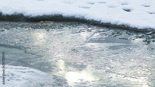 Fotografie Hole in the ice carved out for swimming, hardening winter.