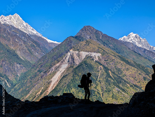 Konstfotografi Silhouette of a lone trekker journeying through the majestic landscapes of Nepal