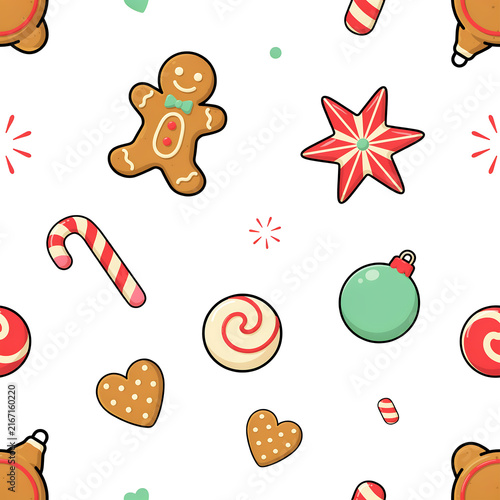 Festive Christmas cookies and candy scattered playfully during winter holidays