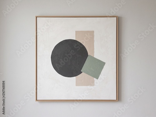 Minimalist abstract geometric art with black circle and diagonal colored shapes