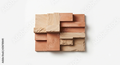 Macro texture of warm plaster wall with soft botanical shadows and copy space