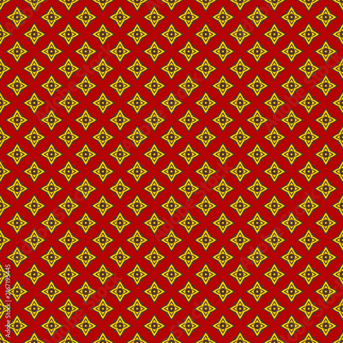 Traditional golden floral geometric pattern on red background.