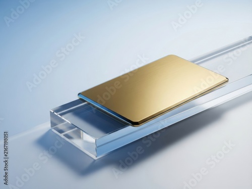 Gold credit card on glass block, premium banking and luxury financial payment concept