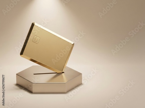 Gold credit card on a pedestal for luxury banking and premium financial services concept.