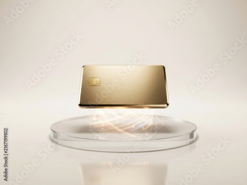 Gold credit card floating above a glass pedestal for luxury banking and financial services.