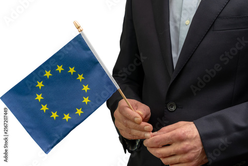 Canvas Print Businessman holding European Union flag isolated on white background cutout