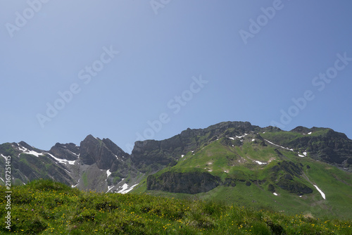 Swiss Alps mountain view with spring snow in Melchsee‑Frutt, Switzerland.