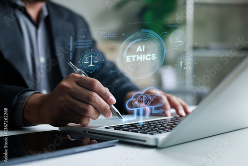 Obraz na plátně Business professional reviews AI ethics on a laptop with digital governance icon