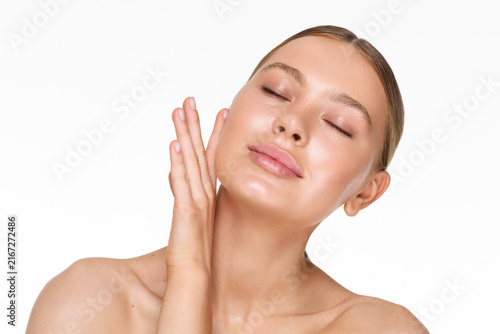 Fotografie Beautiful woman face with healthy clean spa concept cosmetic skin care
