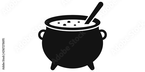 Fotografie Witch cauldron silhouette with stirring spoon for halloween and magic brew themed designs