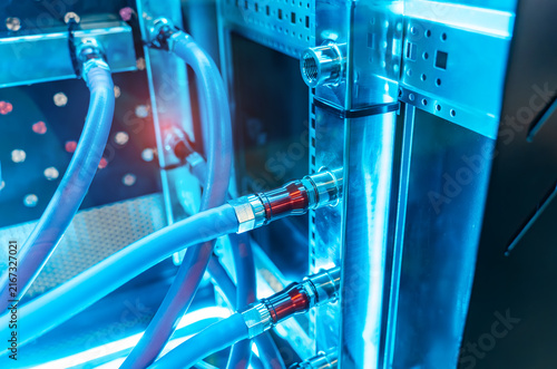фотографія server racks with a liquid cooled supercomputer system with tube