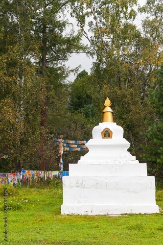 Buddhist stupa or suburgan near the datsan Bodhidharma in the village of Arshan in the foothill valley of the Tunka Nature Park. Siberia, Baikal Region, Buryatia, Tunka Valley