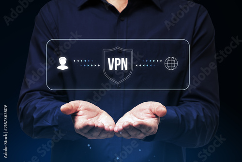 Quadro su tela VPN security concept with shield icon, connected user and globe interface presented over a businessperson's hands on a dark blue background