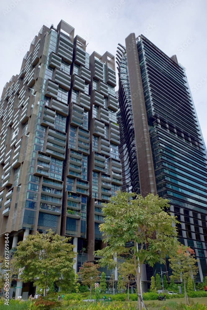 Obraz premium Modern residential towers with green terraces and trees, Singapore