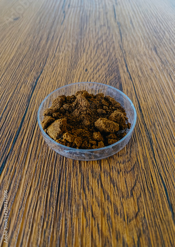 Ashtray with coffee grounds for protection bad smell inside.