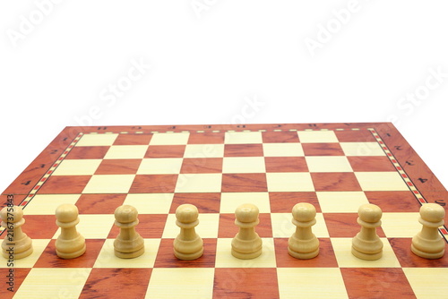 Wooden chess game. Concept pieces. Straight line of white pawns.
