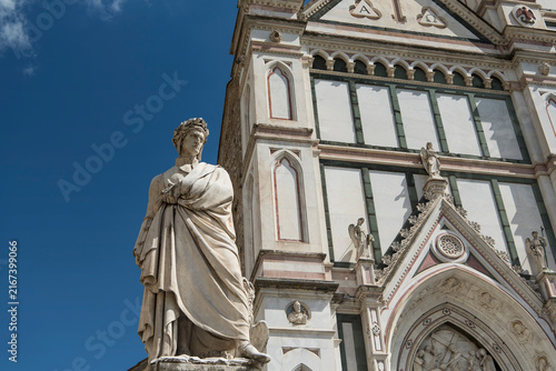 A statue of Dante Alighieri near the basilica of Santa Croce in Florence Italy