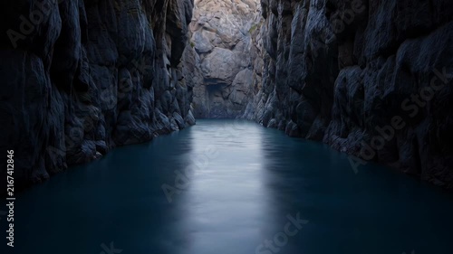 ?Majestic canyon water flow: tranquil stream journey through rocky landscape