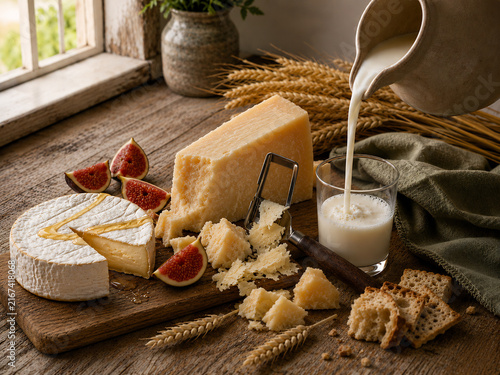 3D rendering of Brie and Parmesan with figs, honey and fresh milk