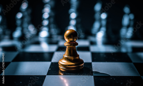 фотографія chess pieces on a chessboard
