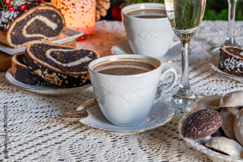 Christmas coffee with selection of gourmet cakes and champagne