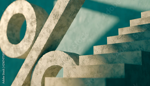 Low angle view of giant stone percentage symbol beside ascending staircase. Rising interest rates and financial success concept. Concrete stairs climbing upward next to percent icon