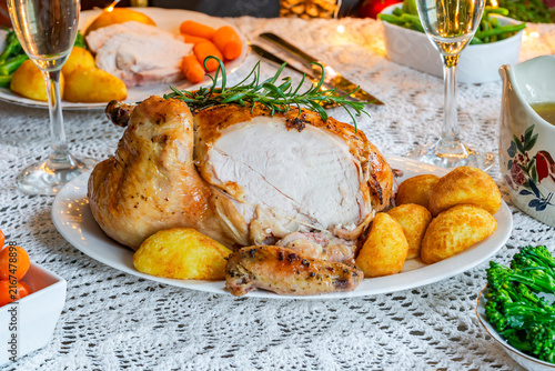 Christmas dinner with roast chicken, potatoes and vegetables