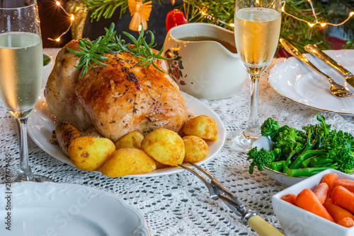 Christmas dinner with roast chicken, potatoes and vegetables