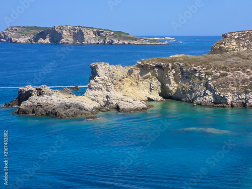 Panoramic View of Capraia Island and Rocky Coastline in Tremiti Archipelago, Apulia, Italy – Beautiful Turquoise Sea and Limestone Cliffs Under Blue Sky