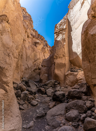 Принти на полотні A view along the boulder strewn floor of the Culebrillas canyon close to Arequip