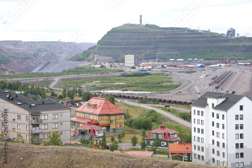 Obraz na płótnie High-angle panoramic view of Kiruna cityscape showing modern residential apartment buildings against the backdrop of the massive LKAB iron ore mine