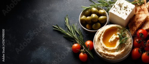 Mediterranean Hummus Bowl with Feta Cheese, Olives, and Pita Bread