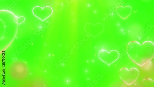 Glowing white heart outlines floating gently against a bright green background with sparkling star effects with rising slowly vibrant video glowing shapes rising animation