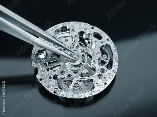 Bild auf Leinwand Concept of precision craftsmanship in detailed watch repair process