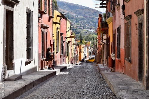 narrow cobblestone city street 