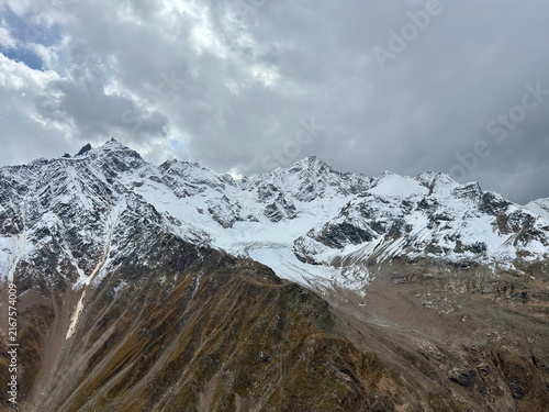 Obraz na płótnie Snow-Covered Rugged Mountain Peak in Winter Alpine Landscape