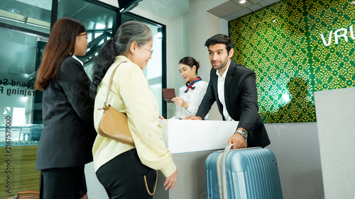 Принти на полотні Business traveler receives attentive service at a VIP airport counter with luggage nearby representing efficient executive travel and premium hospitality
