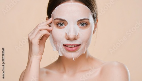 Woman applying skincare sheet mask while looking at camera, clean beauty advertising composition
