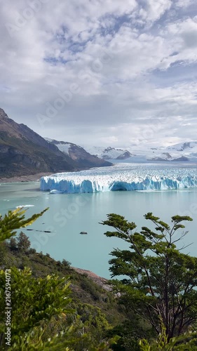Panoramic vertical view of the Perito Moreno Glacier and turquoise lake in Los Glaciares National Park, Patagonia, Argentina