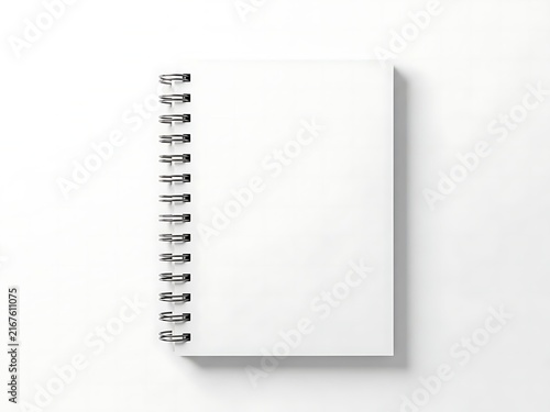 Blank white spiral notebook with metal rings for school office work and creative writing projects