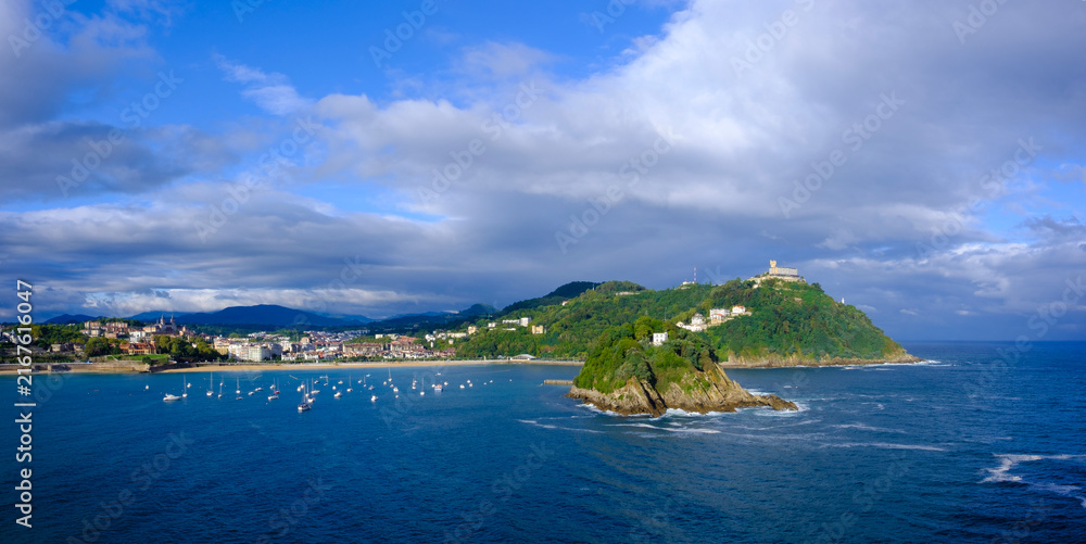 Fototapeta premium Santa Clara Island and Mount Igueldo in La Concha Bay, San Sebastian, Basque Country, Spain