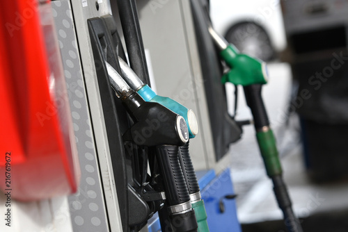 Obraz na plátne Fuel pump nozzles at a service station