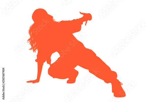 Fotografie Dynamic orange silhouette of a breakdancer performing an energetic street dance pose isolated on a white background
