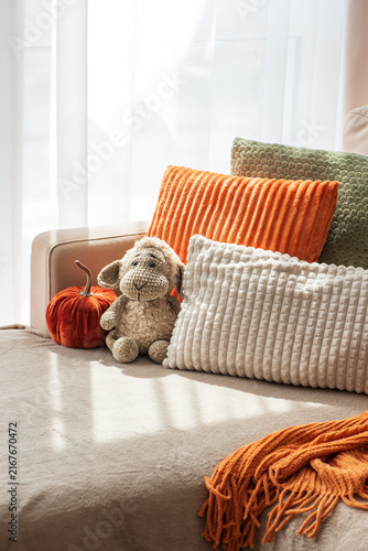 Cozy Autumnal Decor Arrangement Sofa Comfort Home Interior With Stuffed Toy Pumpkin Pillows And Blanket