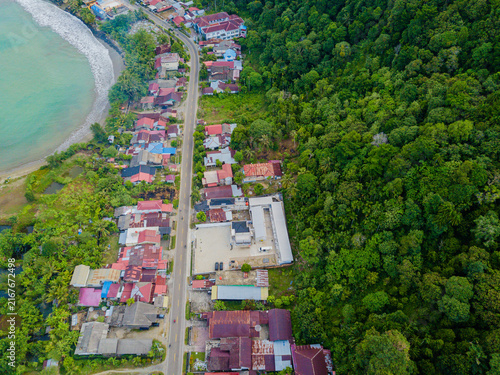 Konstfotografi Aerial drone view of countryside settlements by the coastal scenery at Tapak Tua