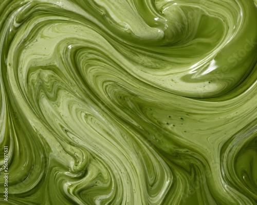 Marbled matcha cream swirl flowing in smooth green tea waves, abstract glossy macro texture with soft organic movement and café-inspired mood for clean girl matcha, matcha lifestyle and calm energy