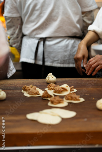 Steamed Bun Preparation At Restaurant Counter Fresh Display