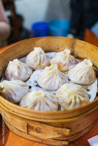 Steamed Soup Dumplings In Bamboo Basket Cafe Scene