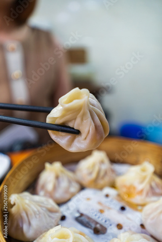 Steamed Soup Dumplings In Bamboo Basket Detail Shot